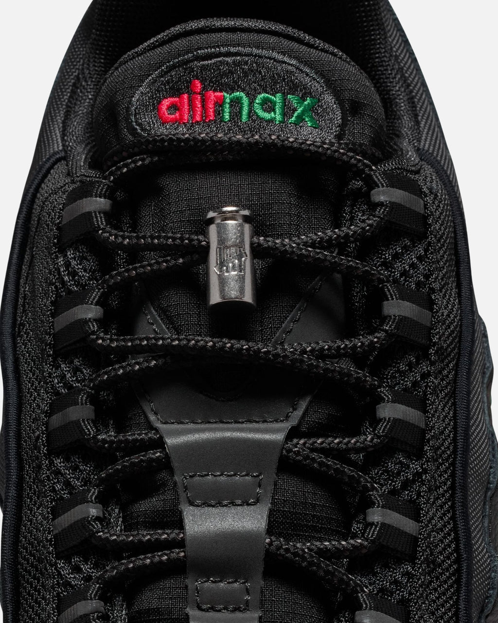 UNDEFEATED x Nike Air Max 95 Sneakers – Black with Red & Green Accents